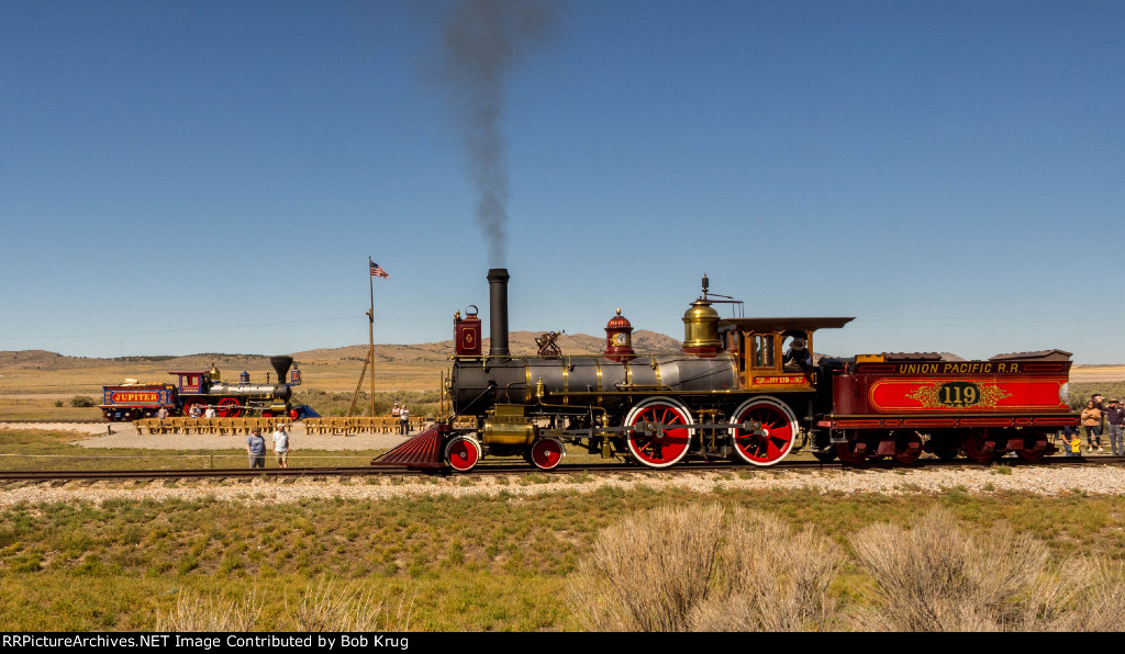 UP 119 doing a run-by on a separate track put in for this purpose.  Jupiter sits back at the Golden Spike site on the original track alignment.